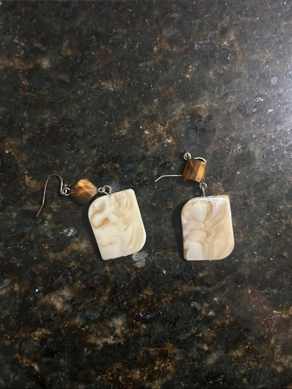 2 bracelets 1 necklace and 1 pair of earrings